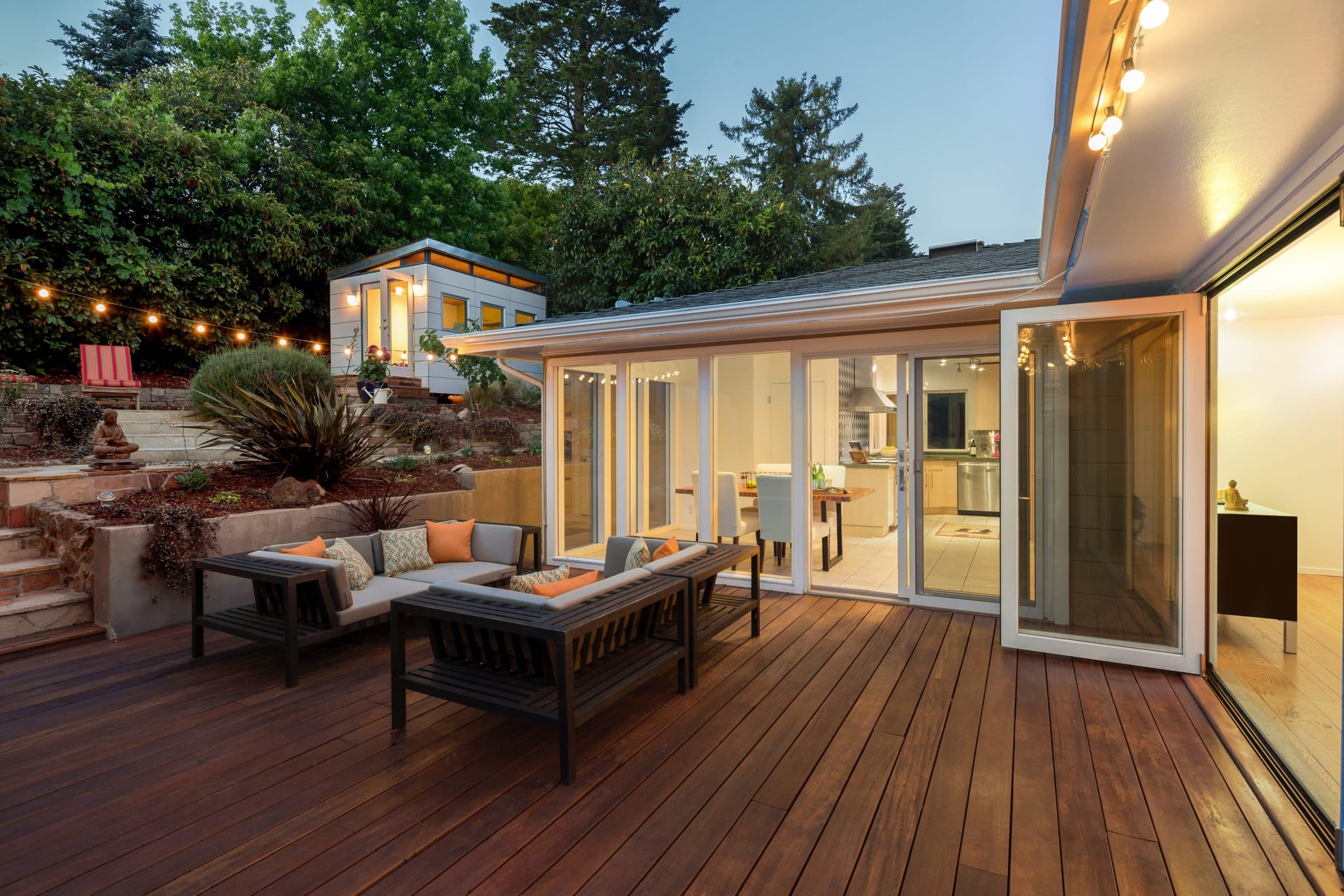 Pool deck and outdoor living area at twilight